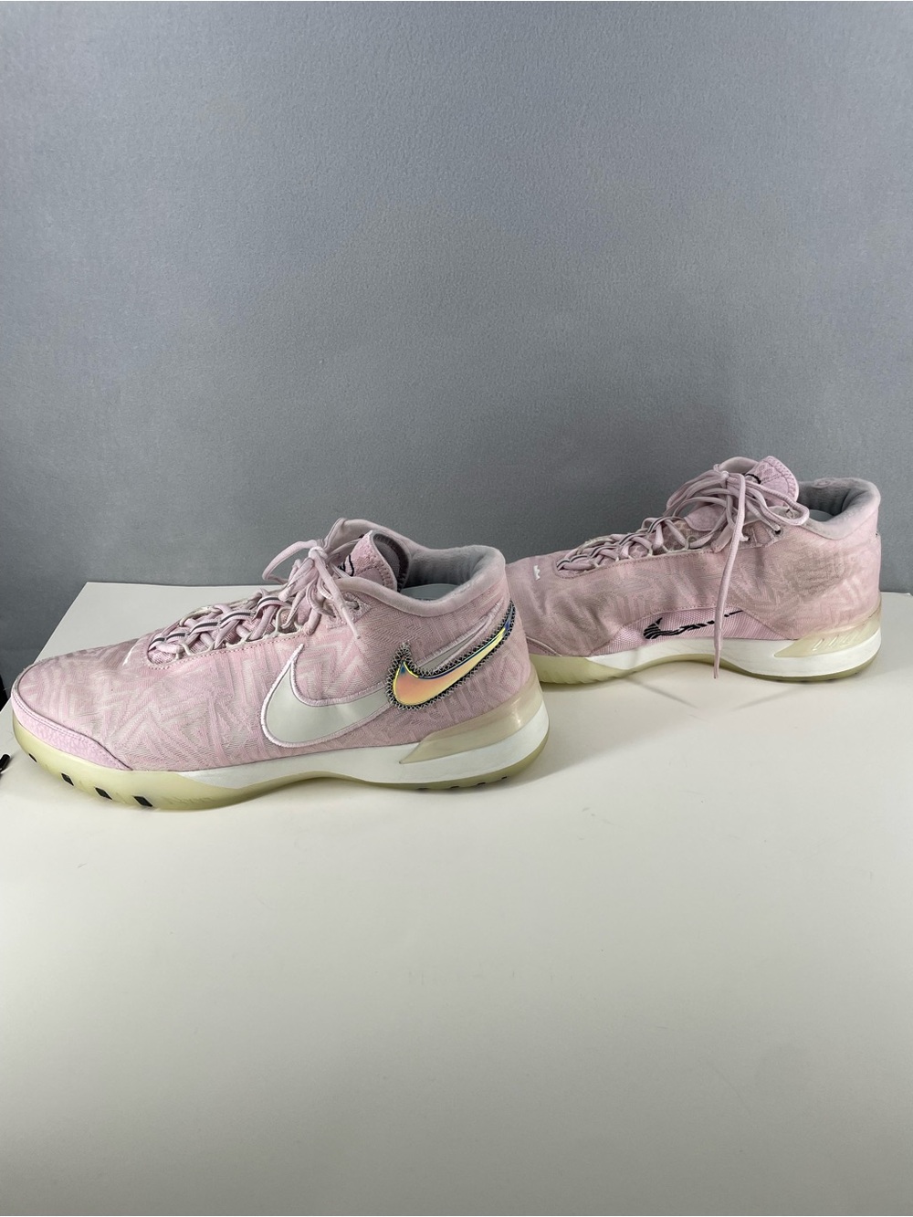 Nike Women’s Light Pink Low-Top Athletic Sneakers with Iridescent Swoosh